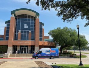 Leak Geeks plumbing in front of Hurst city hall