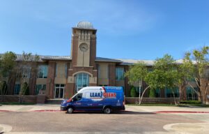 Leak Geeks plumbing van in front of Keller town hall