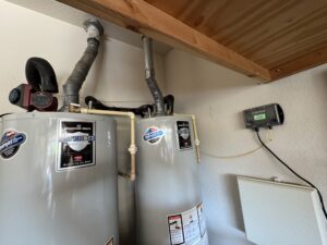 Flow-tech water treatment installed with tank water heaters in Keller