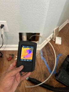 Leak detected in a wall with a moisture reader in Keller